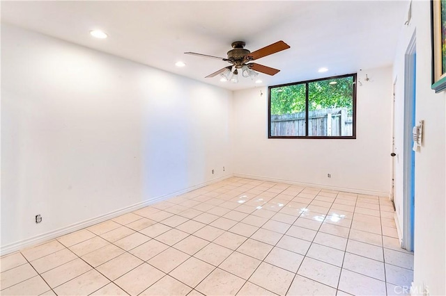 empty room with light tile patterned floors, baseboards, recessed lighting, and a ceiling fan