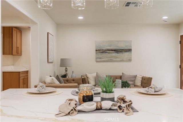 dining room with visible vents and recessed lighting