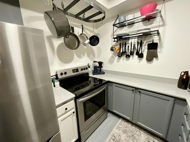 432 Edgehill Ln Unit 175, Oceanside, CA 92054 - kitchen featuring light countertops and stainless steel appliances