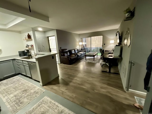 432 Edgehill Ln Unit 175, Oceanside, CA 92054 - kitchen featuring a peninsula, light countertops, open floor plan, gray cabinets, and dishwasher