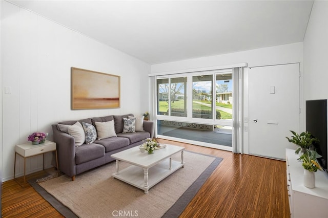 living area with wood finished floors