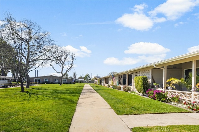 exterior space with a yard