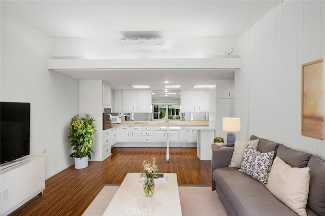 living area featuring wood finished floors