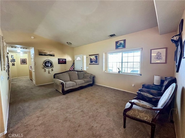 living room featuring visible vents, baseboards, carpet, and lofted ceiling