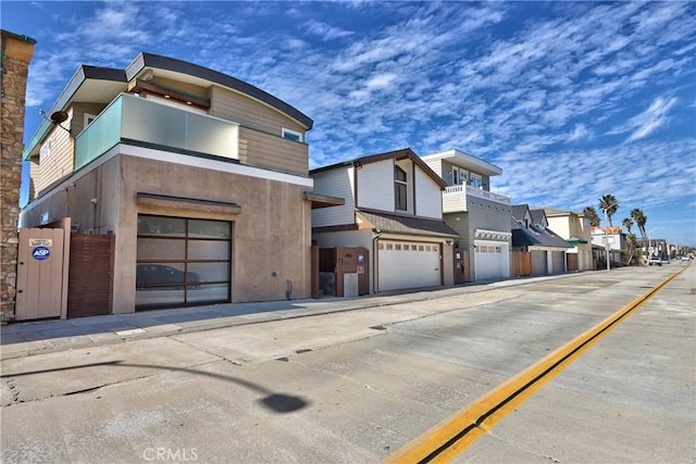 contemporary house with a balcony and a residential view