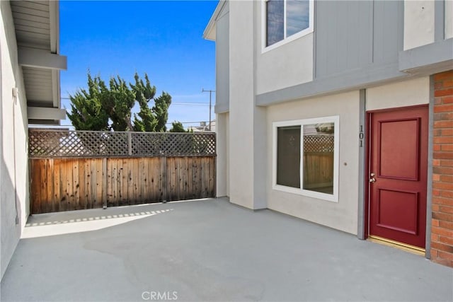 view of patio / terrace with fence