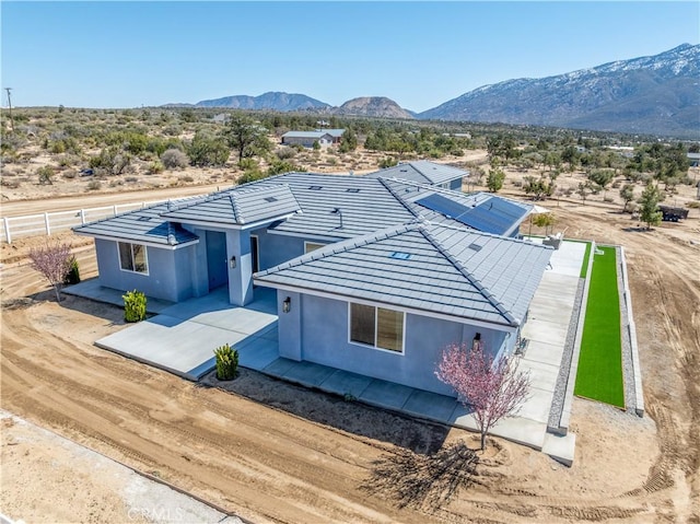 exterior space with a mountain view