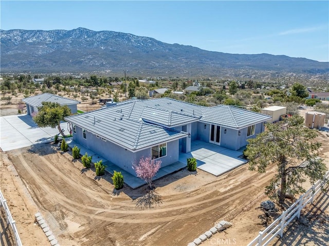 drone / aerial view featuring a mountain view