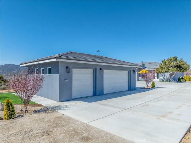 garage with driveway