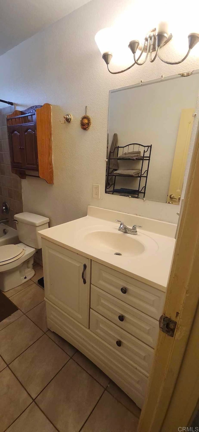 44600 Brawley Ave, Jacumba, CA 91934 - full bath featuring vanity, tile patterned flooring, toilet, and washtub / shower combination