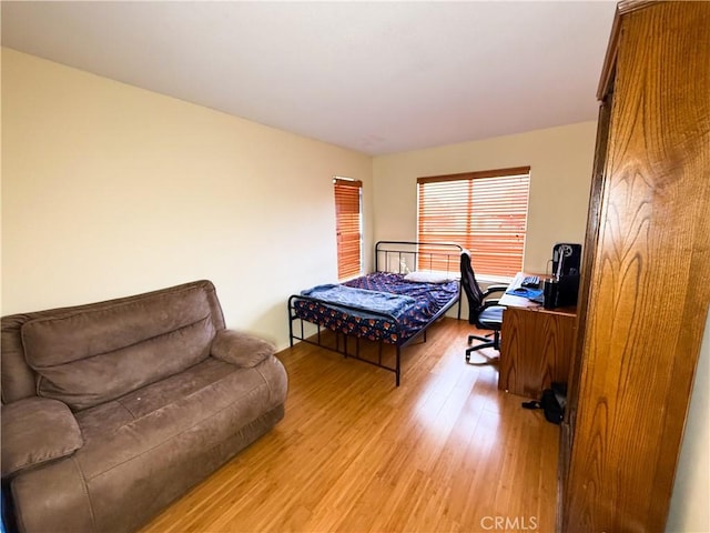 bedroom featuring light wood-type flooring