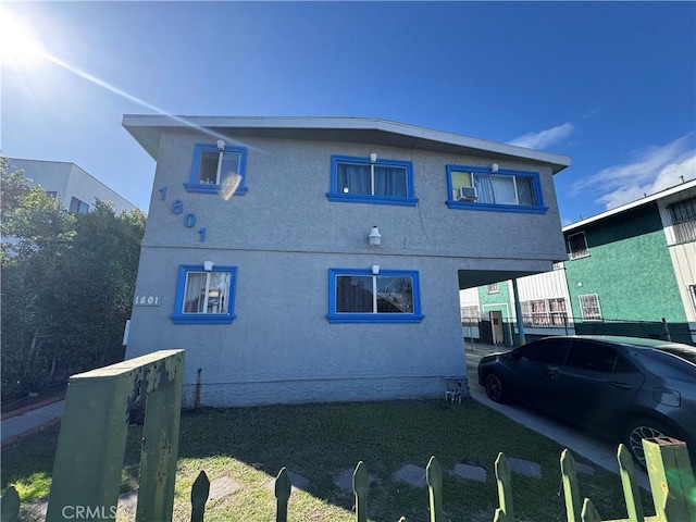 view of home's exterior with stucco siding