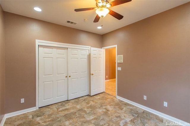 unfurnished bedroom featuring baseboards, visible vents, recessed lighting, ceiling fan, and a closet