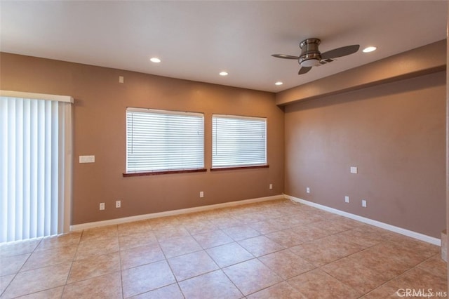 spare room featuring recessed lighting, baseboards, and a ceiling fan