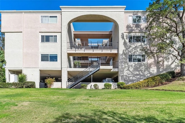 view of property with stairway