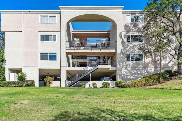 5519 Paseo Del Lago E Unit 2H, Laguna Woods, CA 92637 - view of apartment building / complex with stairs