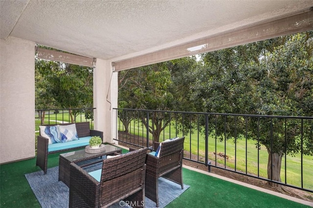 balcony with an outdoor hangout area