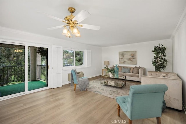5519 Paseo Del Lago E Unit 2H, Laguna Woods, CA 92637 - living room featuring ornamental molding, wood finished floors, baseboards, and ceiling fan