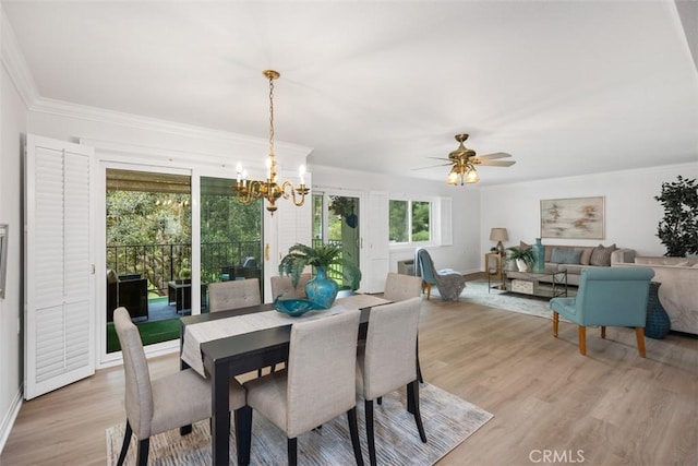 5519 Paseo Del Lago E Unit 2H, Laguna Woods, CA 92637 - dining room featuring a chandelier, light wood-style floors, ornamental molding, baseboards, and ceiling fan