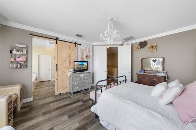 bedroom featuring visible vents, dark wood-style flooring, a barn door, and ornamental molding