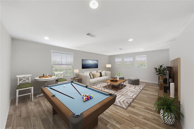 game room featuring visible vents, light wood-type flooring, baseboards, and billiards