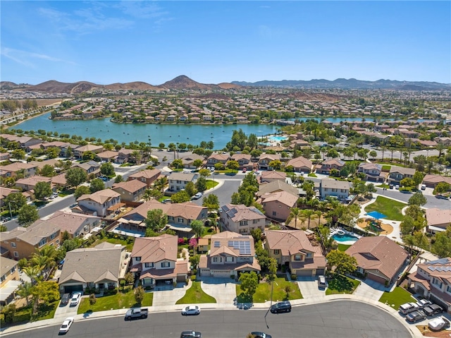 aerial view featuring a residential view and a water and mountain view