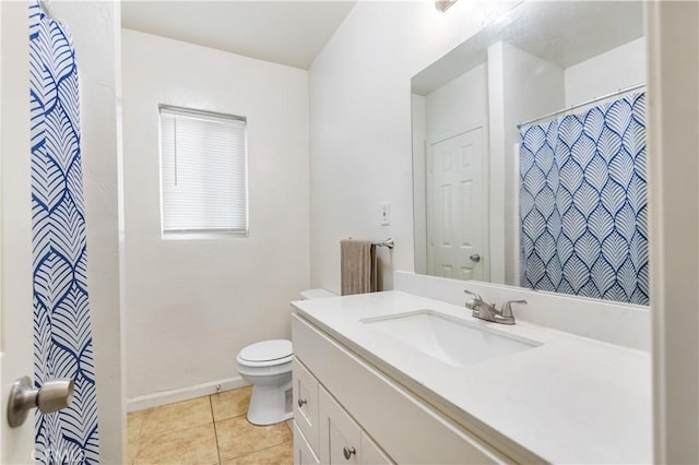 bathroom with vanity, a shower with curtain, baseboards, tile patterned floors, and toilet