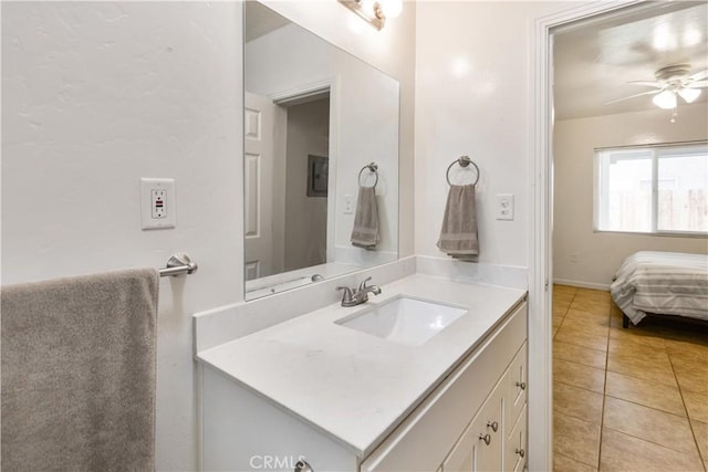 bathroom featuring vanity, tile patterned flooring, and ceiling fan