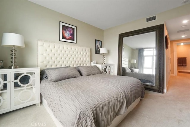 bedroom featuring visible vents and carpet flooring