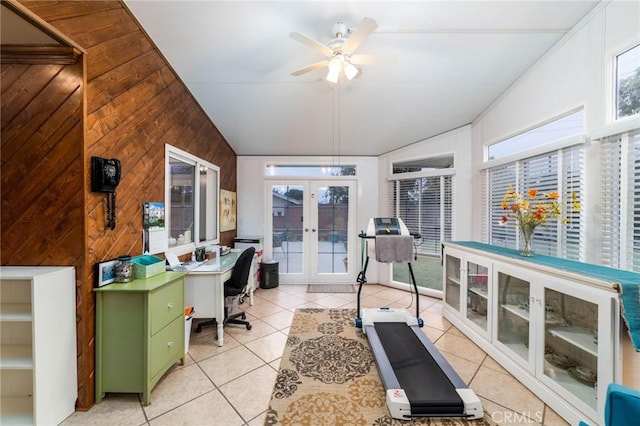 office space with light tile patterned flooring, french doors, a ceiling fan, and vaulted ceiling