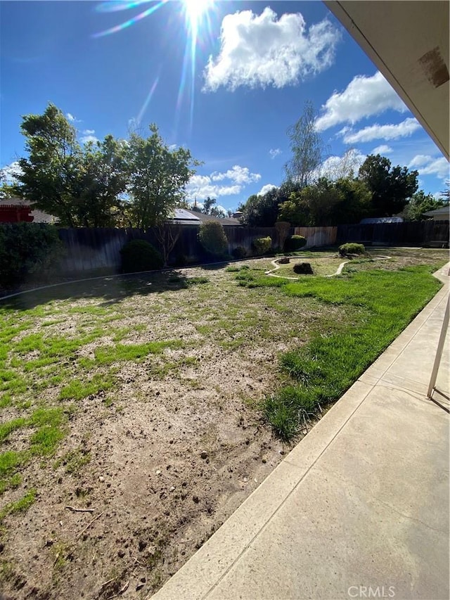 view of yard featuring a fenced backyard
