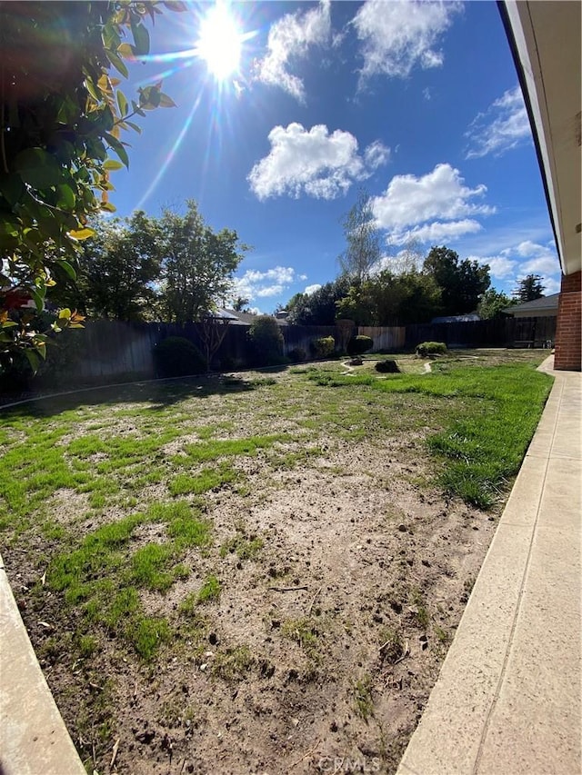view of yard with fence
