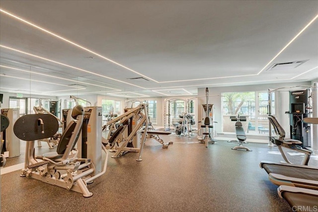 workout area with a wealth of natural light and visible vents
