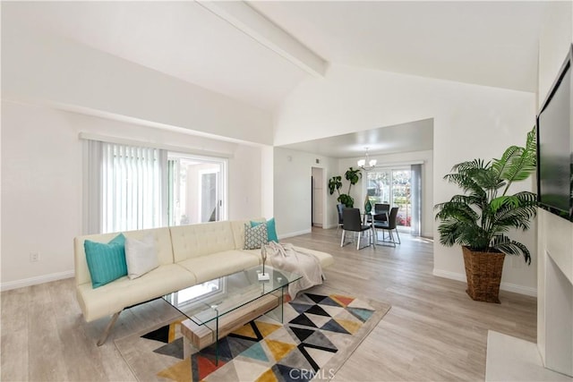 10 Windsong, Irvine, CA 92614 - living room with a chandelier, beamed ceiling, light wood-type flooring, baseboards, and high vaulted ceiling