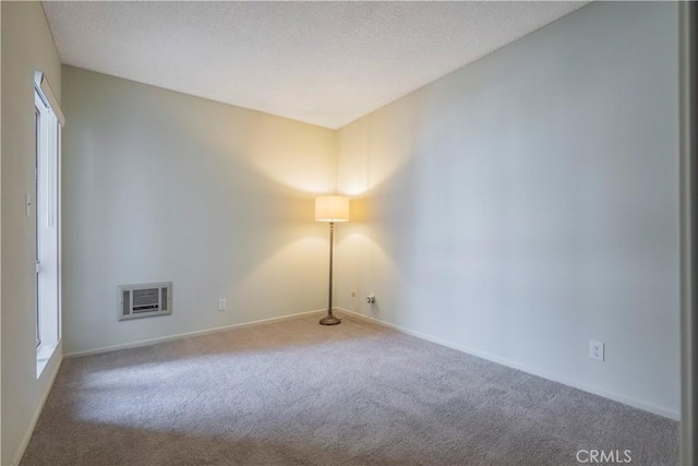 355 S Los Robles Ave Unit 310, Pasadena, CA 91101 - unfurnished room with carpet, baseboards, and a textured ceiling