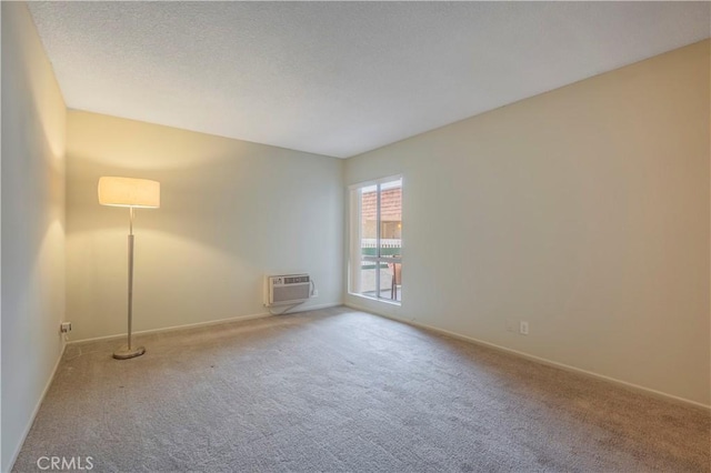 355 S Los Robles Ave Unit 310, Pasadena, CA 91101 - carpeted empty room with a wall mounted AC and baseboards
