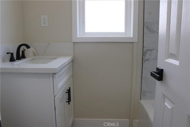 full bath featuring vanity, a shower, and a bathing tub