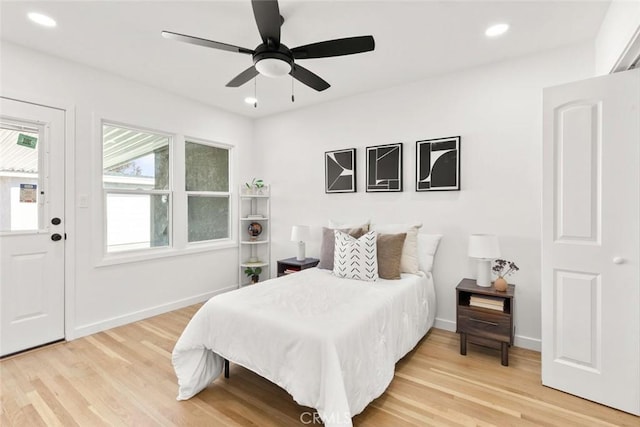 bedroom featuring recessed lighting, baseboards, light wood-style flooring, and a ceiling fan