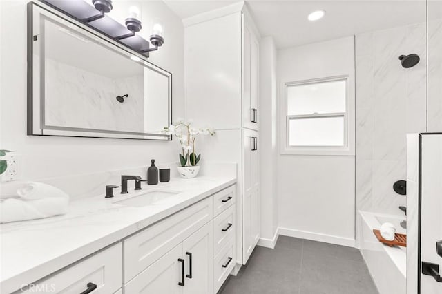 bathroom with tile patterned floors, recessed lighting, tub / shower combination, baseboards, and vanity