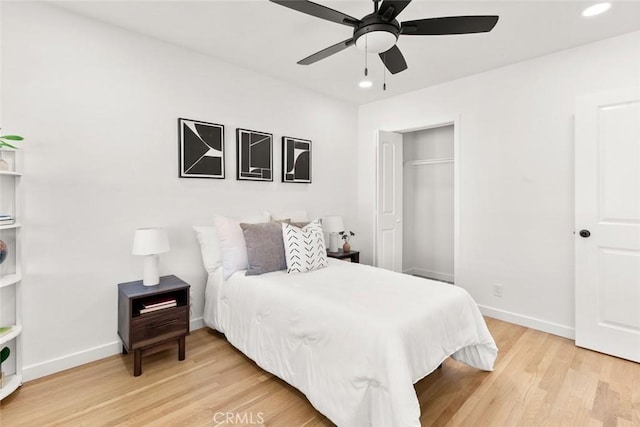 bedroom with recessed lighting, baseboards, light wood-style floors, and ceiling fan