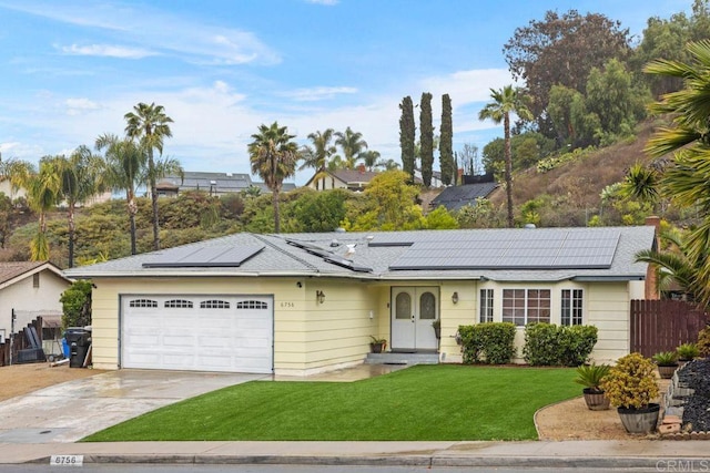 6756 Monte Verde Dr, San Diego, CA 92119 - ranch-style house with solar panels, concrete driveway, a front lawn, and fence