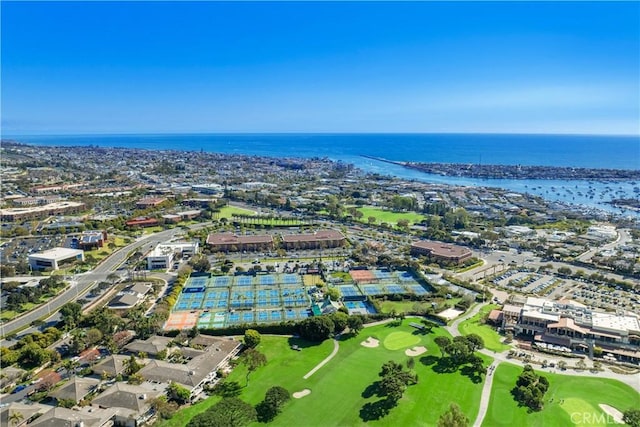 bird's eye view featuring view of golf course and a water view