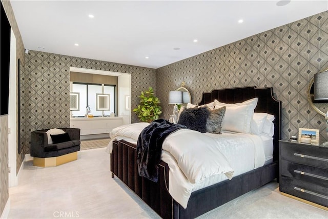 bedroom featuring wallpapered walls and recessed lighting