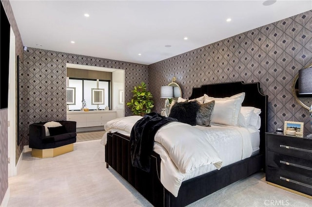 bedroom featuring wallpapered walls and recessed lighting
