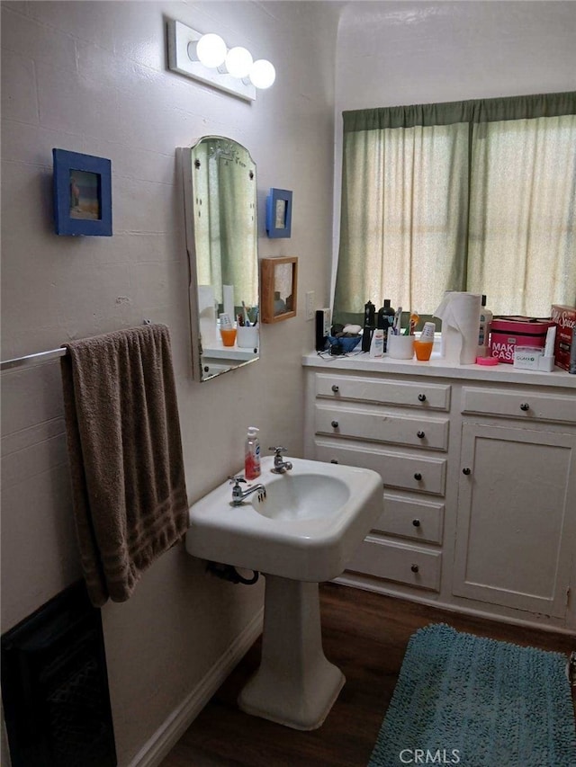 bathroom featuring wood finished floors