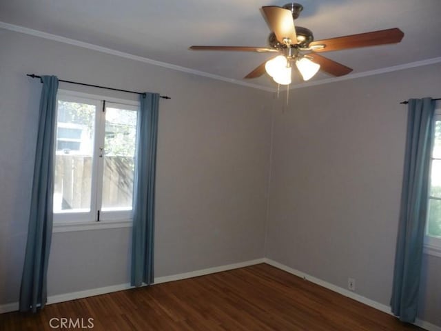 unfurnished room with ceiling fan, baseboards, wood finished floors, and crown molding