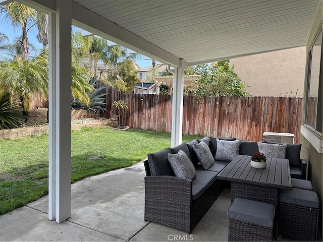 view of patio with an outdoor hangout area and a fenced backyard