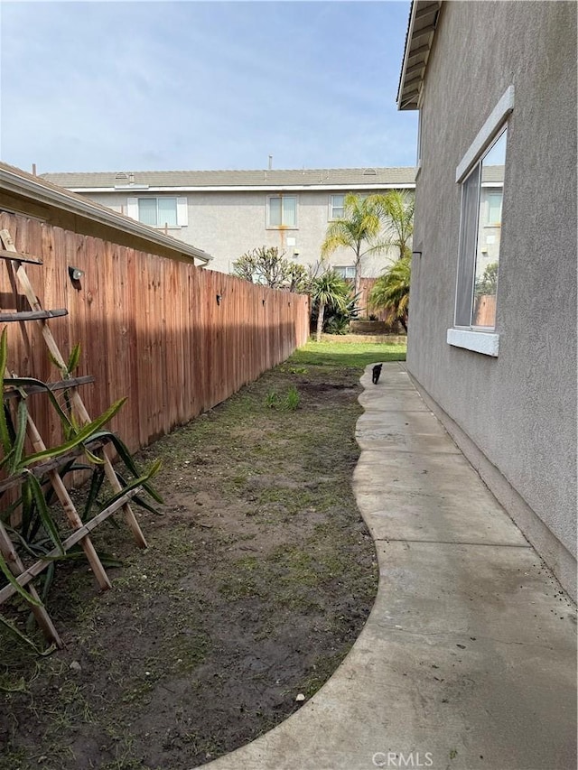 view of yard featuring fence