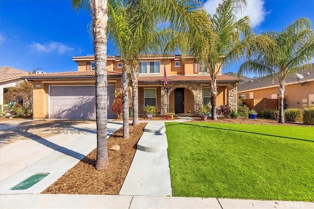 mediterranean / spanish home with stucco siding, concrete driveway, an attached garage, and a tiled roof