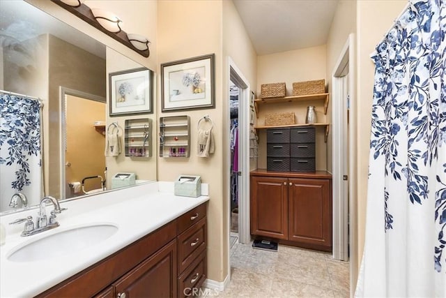 bathroom featuring vanity and a shower with curtain